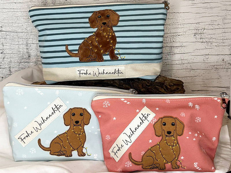 Dackel mit Lichterkette - doodle Stickdatei